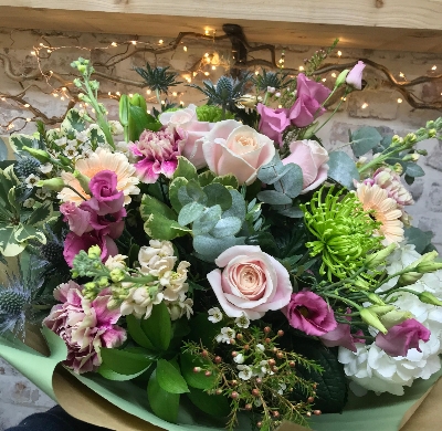 Pretty hand tied bouquet, large in size in an included eco vase.