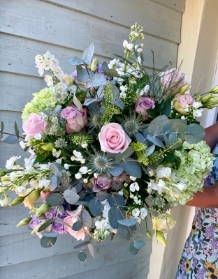 Stunning country garden style hand tied bouquet presented in a gift box in water.
